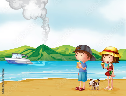 A young girl and a young boy strolling at the beach