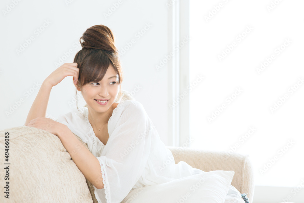 Beautiful asian woman relaxing in the room Beautiful asian woman relaxing in the room
