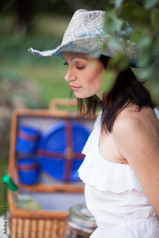 Portrait of a beautiful woman in a garden