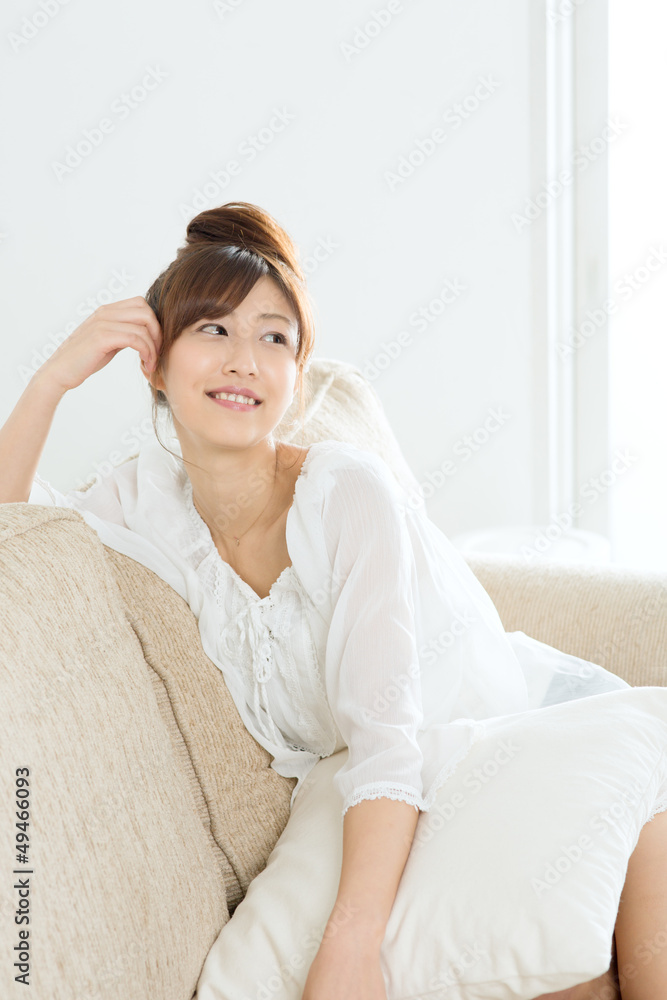 Beautiful asian woman relaxing in the room Beautiful asian woman relaxing in the room