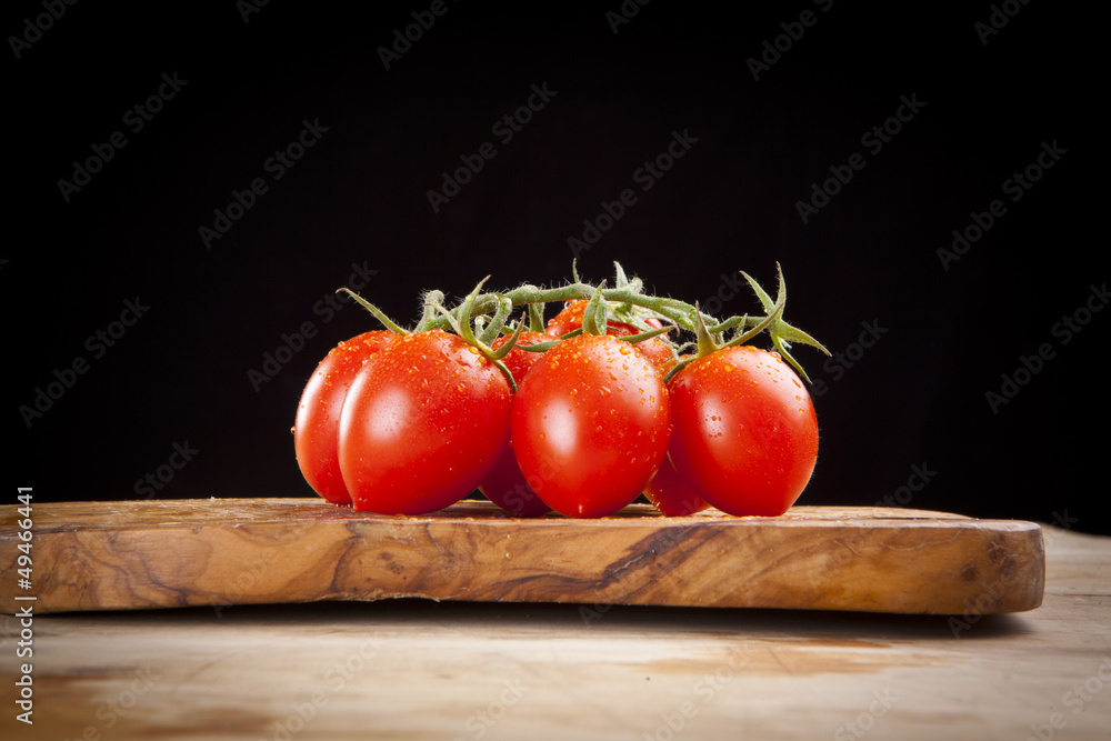 fresh ripe cherry tomato on wooden table fresh ripe cherry tomato on wooden table