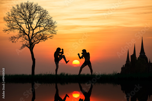Silhouette of a thai's boxing at sunset
