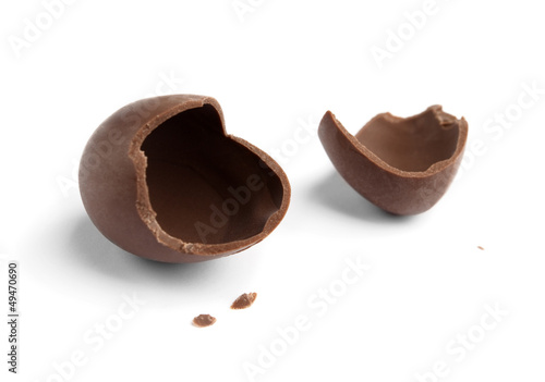 Broken chocolate egg, isolated on white