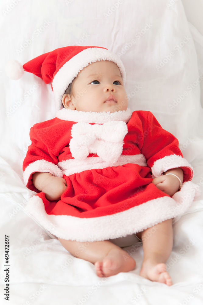 Little girl with santa costume Little girl with santa costume
