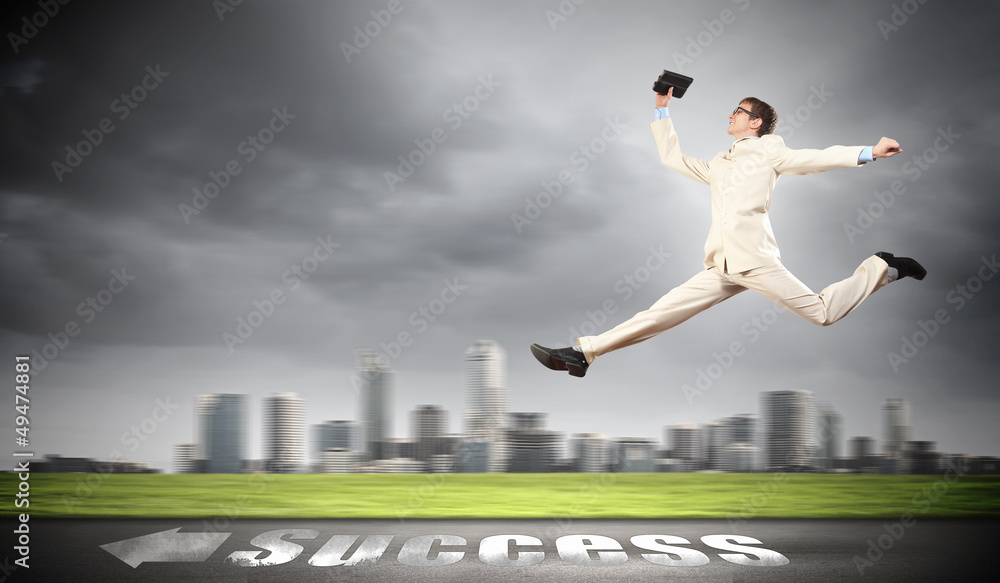 Businessman running on the road