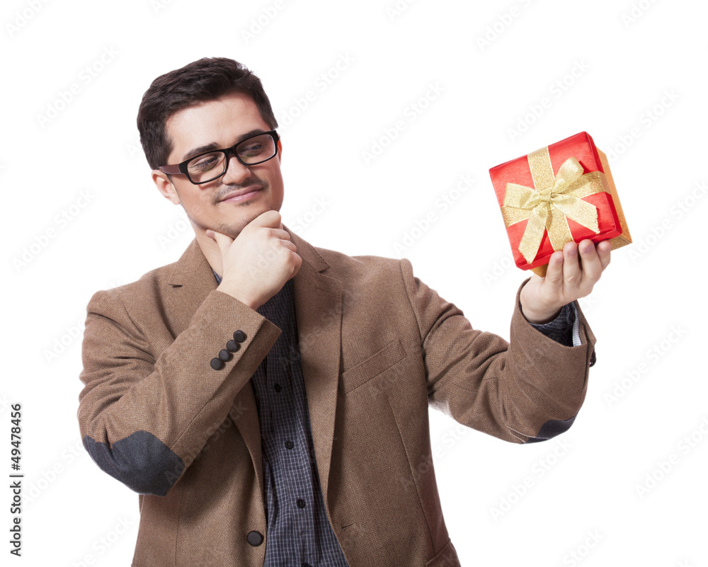 A man holding present box on white background. A man holding present box on white background.