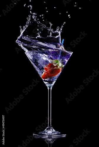 Martini drink over dark bac...