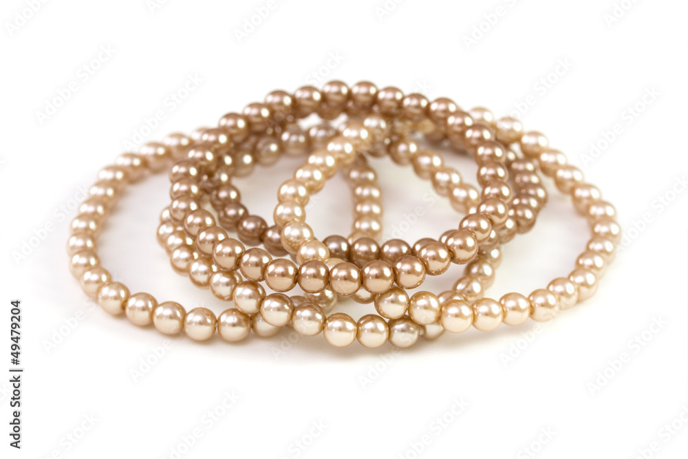brown bead on the white background brown bead on the white background
