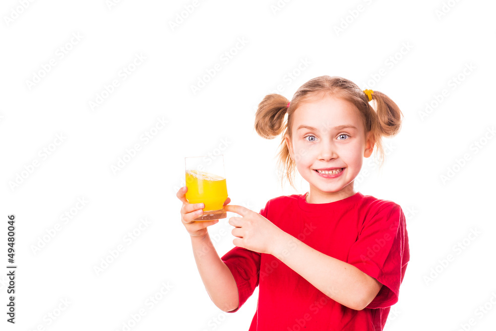 Cute little girl holding glass with juice smiling Cute little girl holding glass with juice smiling