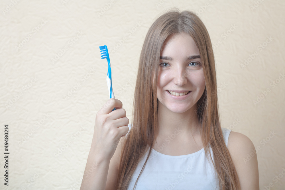 Portrait Of A Blond Woman Brushing Her Teeth Portrait Of A Blond Woman Brushing Her Teeth