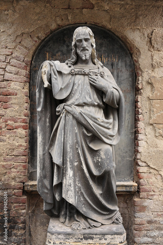 Historic Jesus on the old Prague Cemetery, Czech Republic