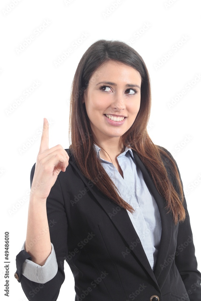 Beautiful businesswoman pointing and watching above Beautiful businesswoman pointing and watching above