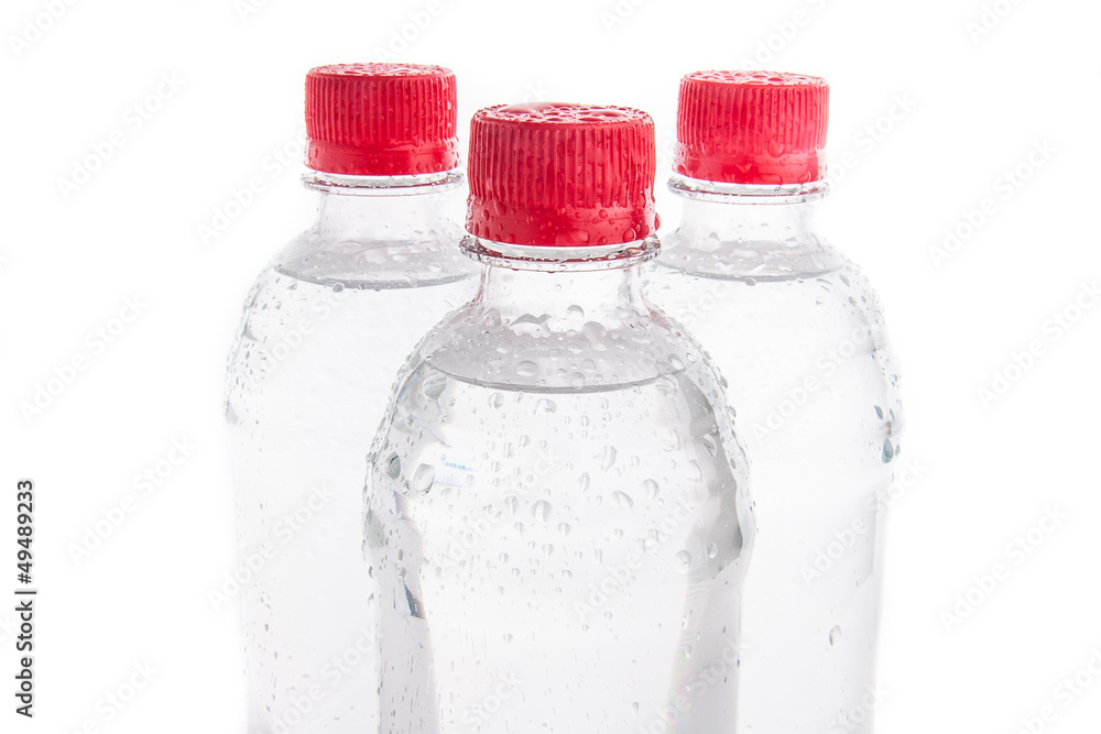Plastic bottles of drinking water isolated