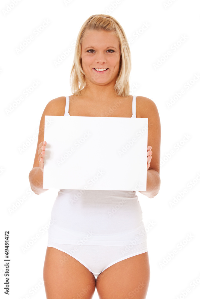 Attraktive junge Frau in Unterwäsche hält weißes Schild Stock-Foto | Adobe  Stock