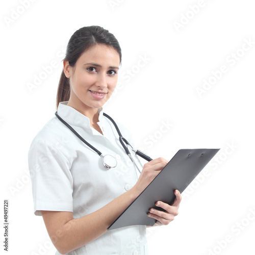 Beautiful nurse smiling and taking notes