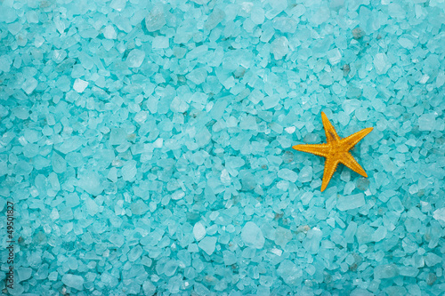 aromatic bath salt and starfish background