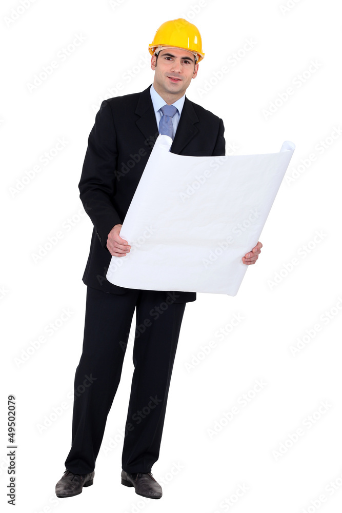 businessman holding a blueprint businessman holding a blueprint