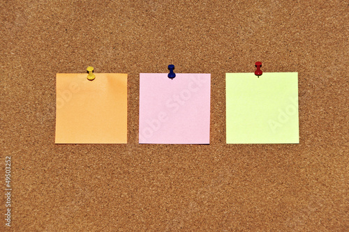 Post it notes on wooden background