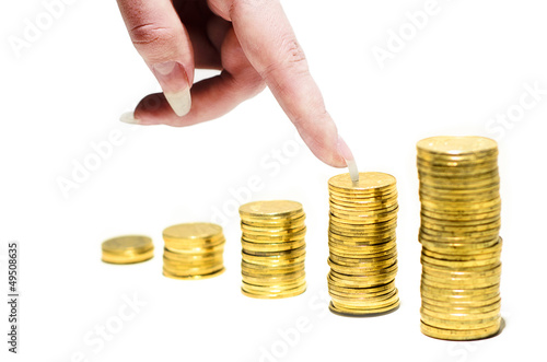 Coins and hand on white background