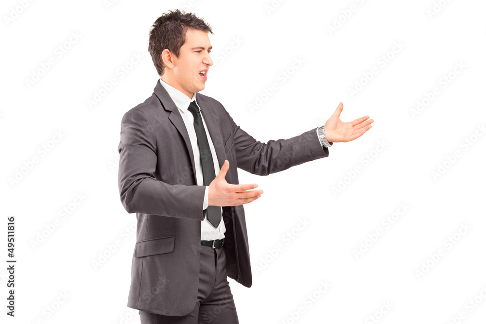 Young professional man in a suit arguing Young professional man in a suit arguing