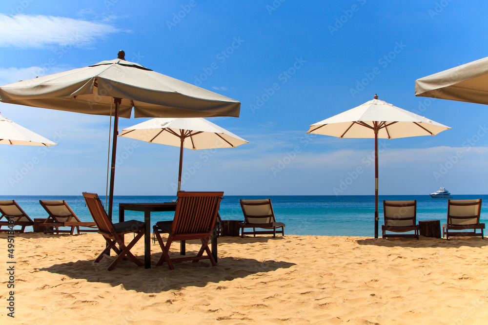 Sunbeds and umbrella on the beach