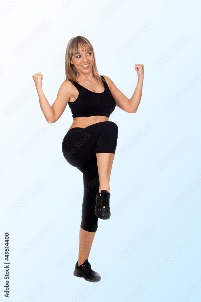 Woman in sportswear exercising Woman in sportswear exercising