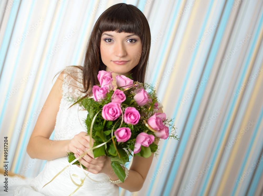 Beautiful bride holding a bouquet