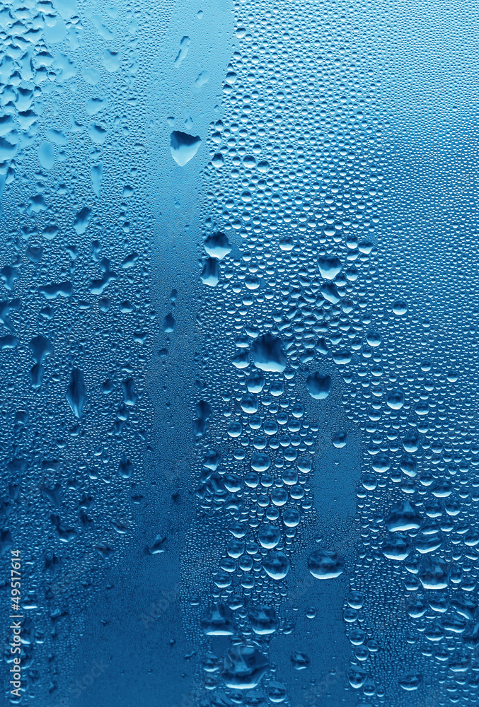Natural water drops on glass Natural water drops on glass