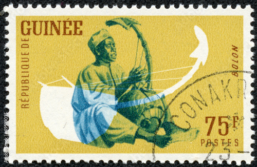 stamp printed by Guinea, shows Musical Instrument, Bolon