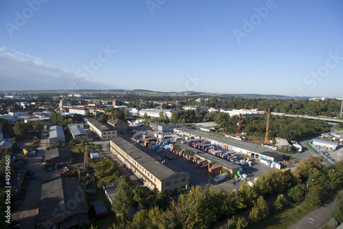 Highly detailed aerial city view with crossroads, roads, factori