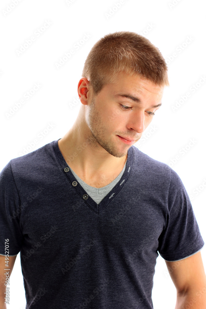Young man looking down isolated Young man looking down isolated