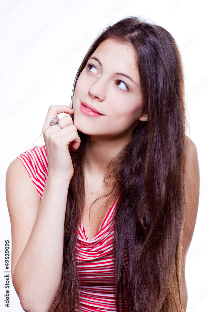 beautiful young girl looking up and thinking beautiful young girl looking up and thinking