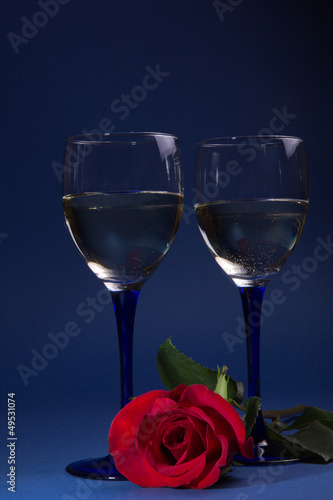 Two glasses with vine and  roses