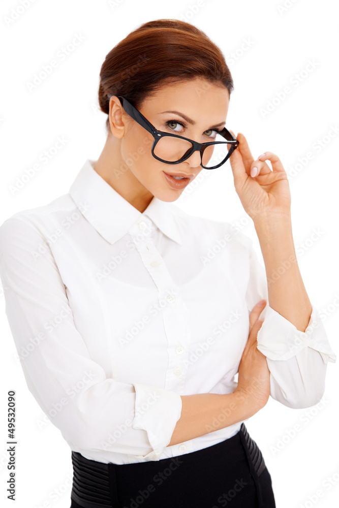Woman peering over her glasses Woman peering over her glasses
