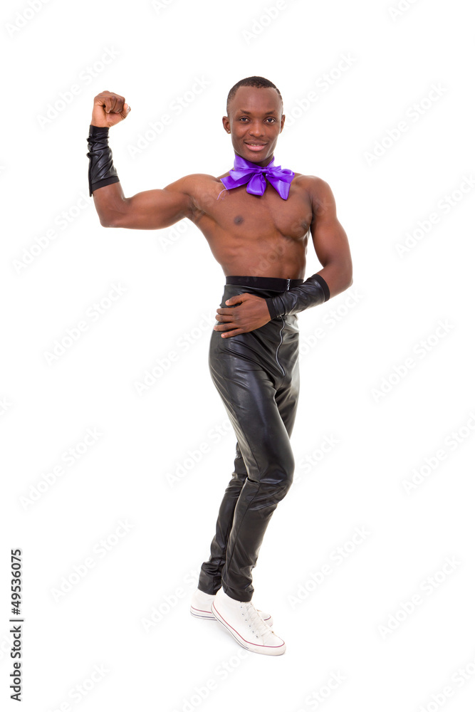 Full length of  friendly smiling muscular man posing