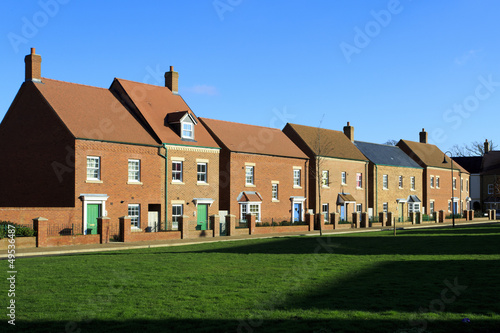 Brand new houses on a village green