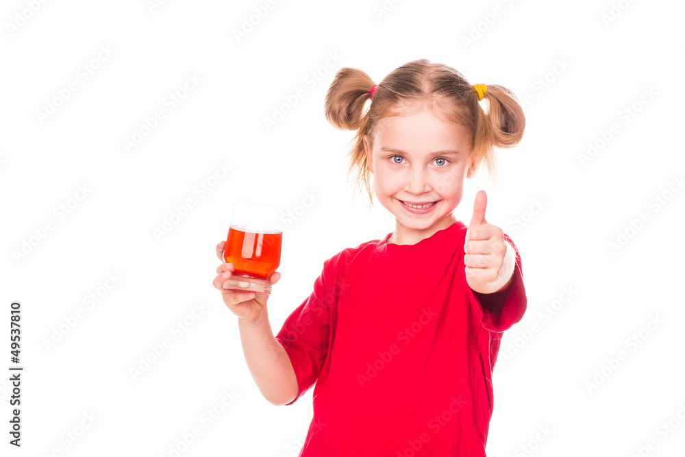 Cute little girl holding glass with juice smiling Cute little girl holding glass with juice smiling