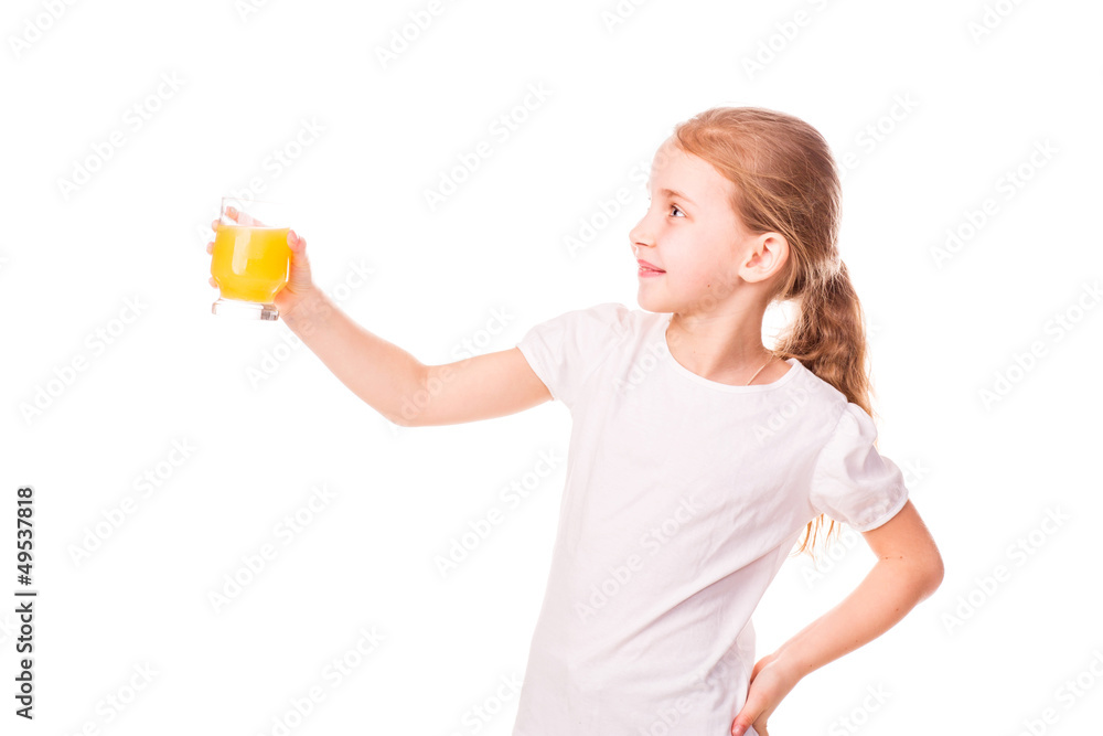 Cute little girl holding glass with juice smiling Cute little girl holding glass with juice smiling