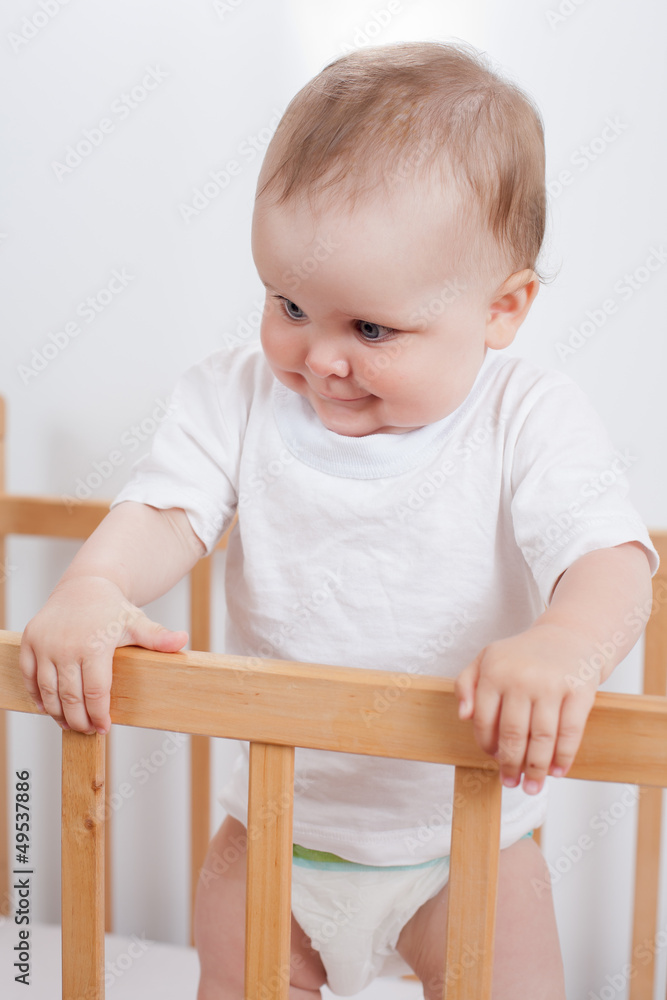 Charming child in the crib Charming child in the crib