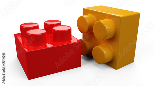 3D colorful plastic toy blocks. Isolated white background.