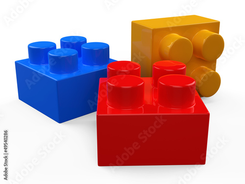 3D colorful plastic toy blocks. Isolated white background.
