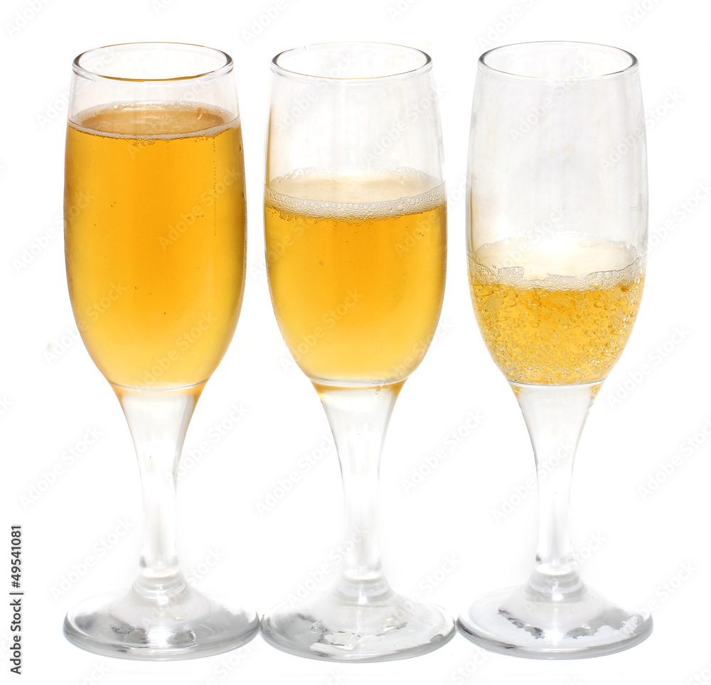 three glasses of champagne on a white background three glasses of champagne on a white background