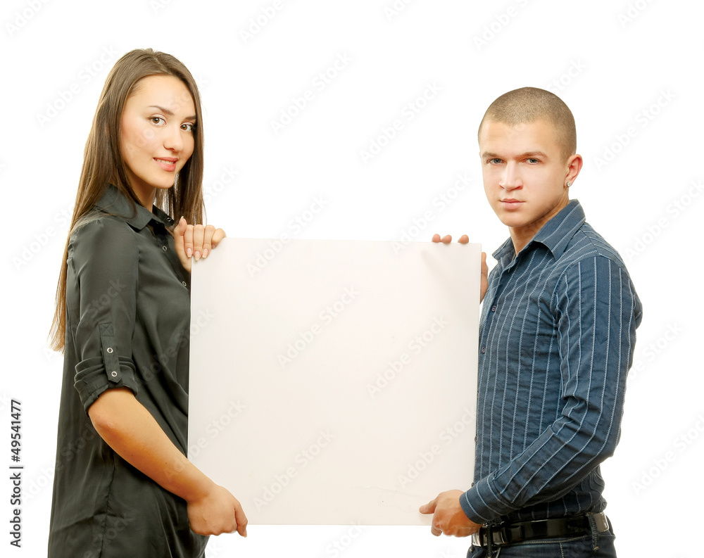 Happy couple holding blank, isolated on white background Happy couple holding blank, isolated on white background