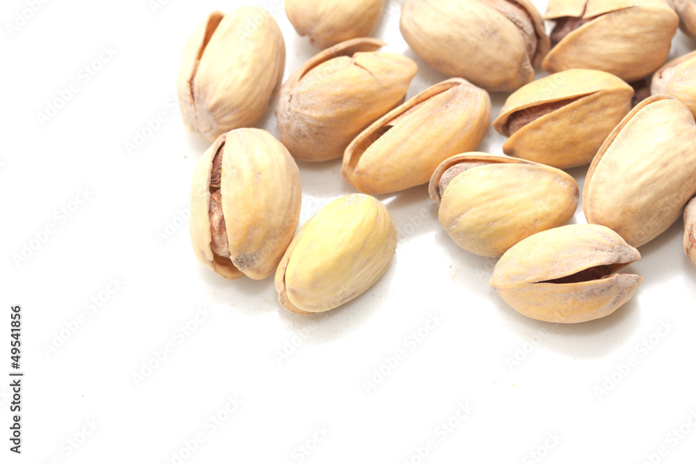 pistachios on a white background. macro pistachios on a white background. macro