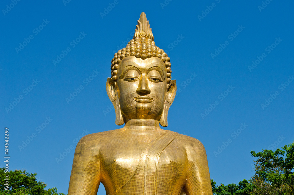 Golden Buddha statue at temple of Thailand