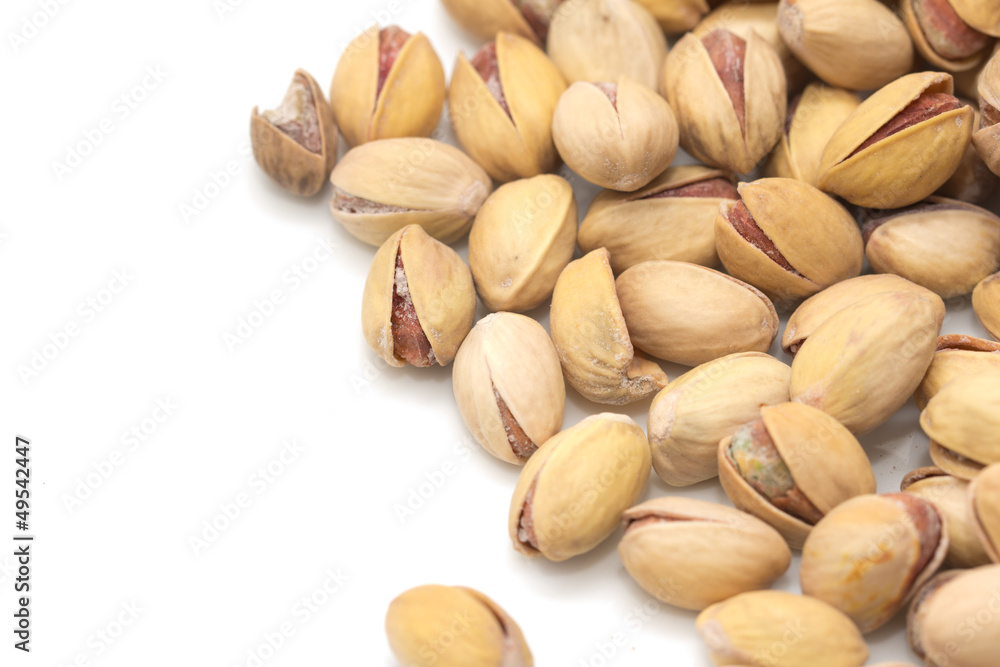pistachios on a white background. macro pistachios on a white background. macro