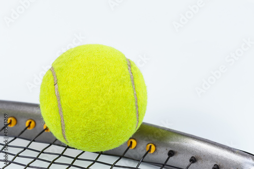 Tennis racket and ball isolated on white background © reborn55