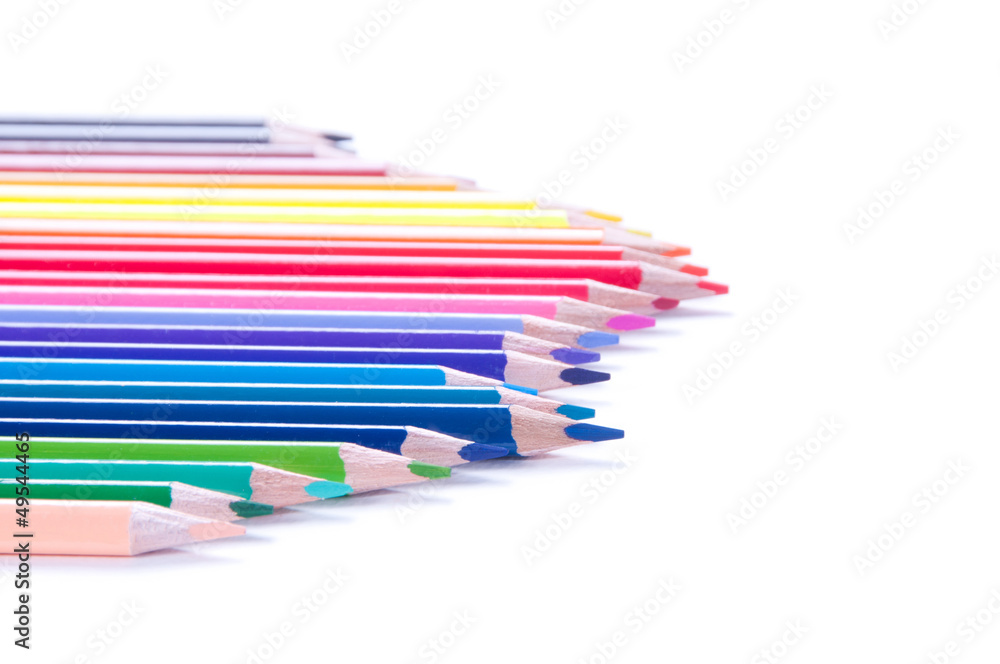 Multicolored pencils in row Multicolored pencils in row