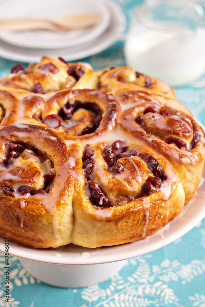 Sweet rolls with dried fruits and dripping glaze Sweet rolls with dried fruits and dripping glaze