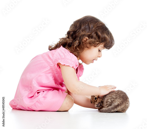 little kid girl playing wit...